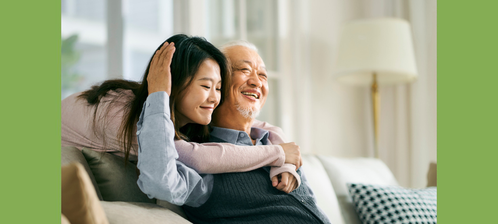 adult caregiver with senior father
