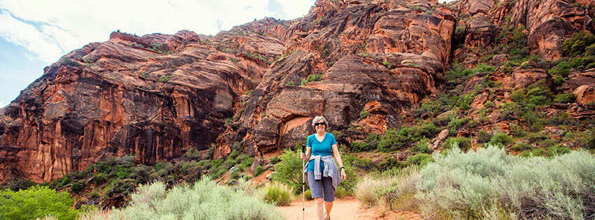 a senior woman hikes in Arizona